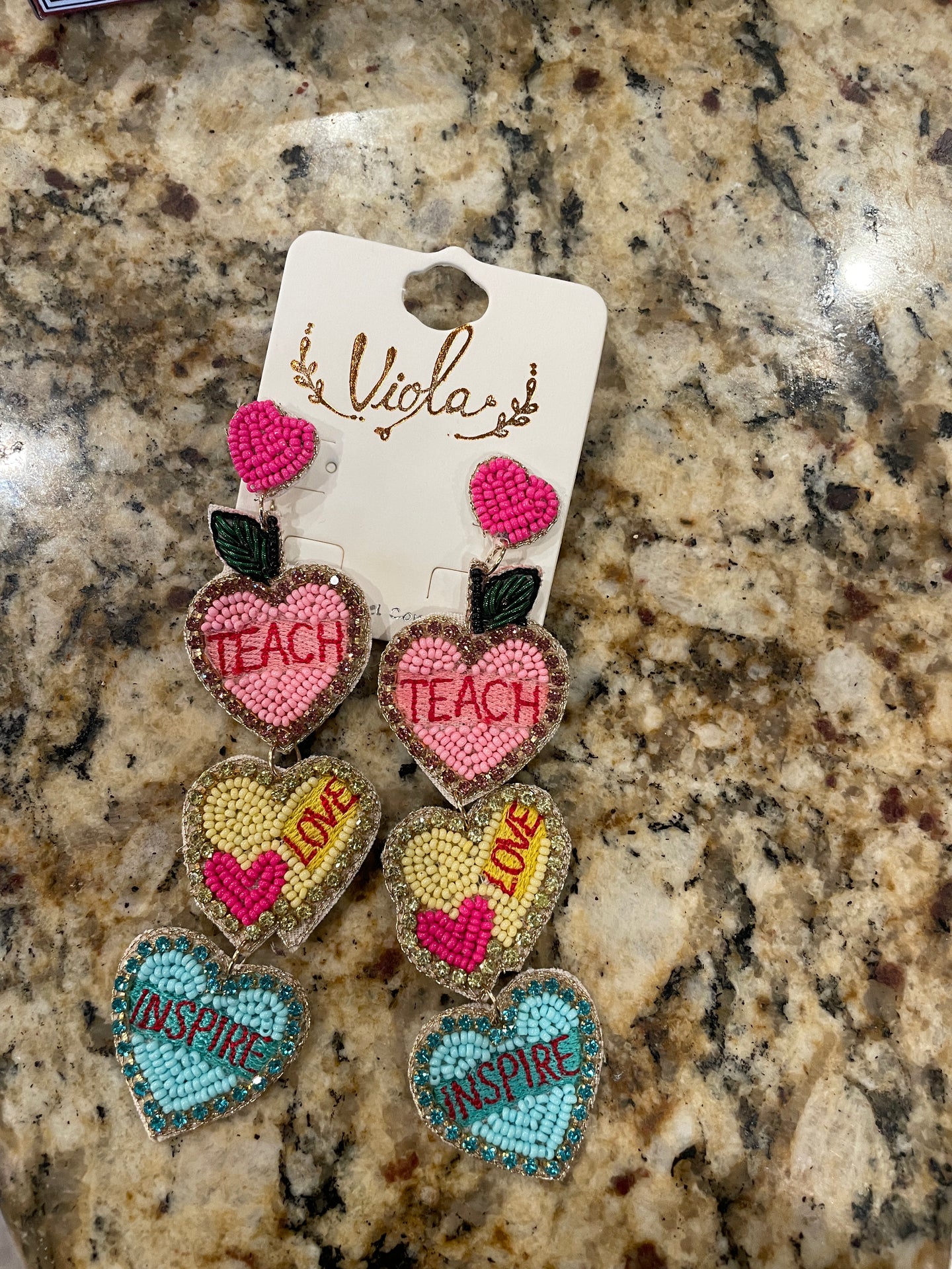 Teach love inspire earring